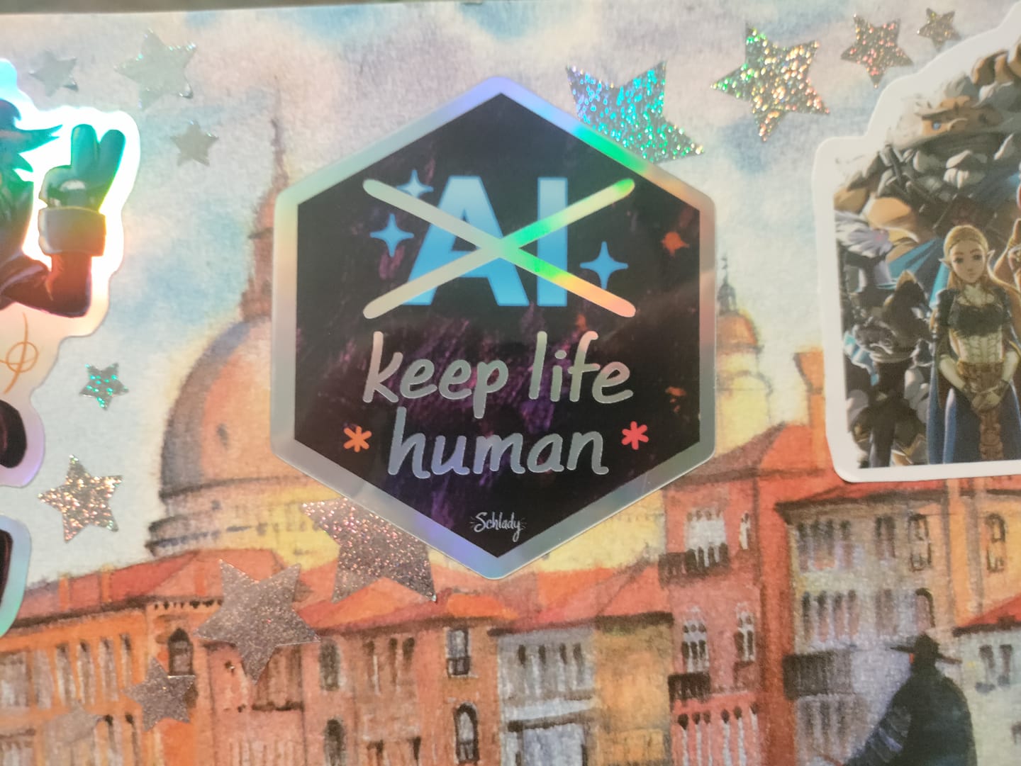 Customer photo review of Keep Life Human - Holographic Hexagon Sticker