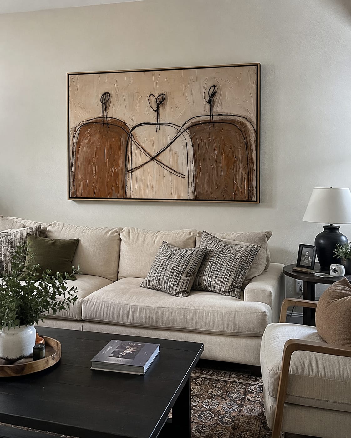 Customer photo review of Linked Silhouettes – Minimalist Cream Line-Figure Painting | Modern Neutral Living Room Art