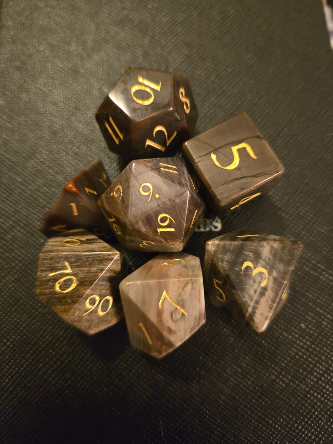 Customer photo review of URWizards D&D Petrified Wood Gemstone Engraved Dice Set(Limited edition)