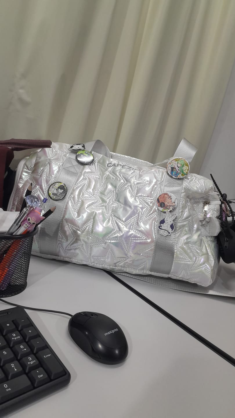 Customer photo review of BOLSA METALLIC STAR - Prata