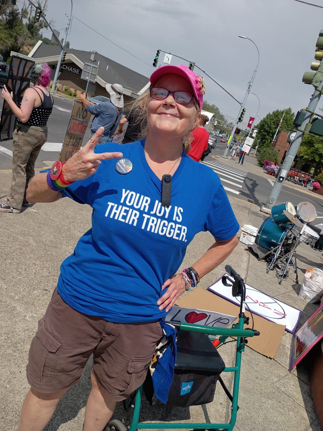 Customer photo review of Your Joy is their Trigger Unisex Tee