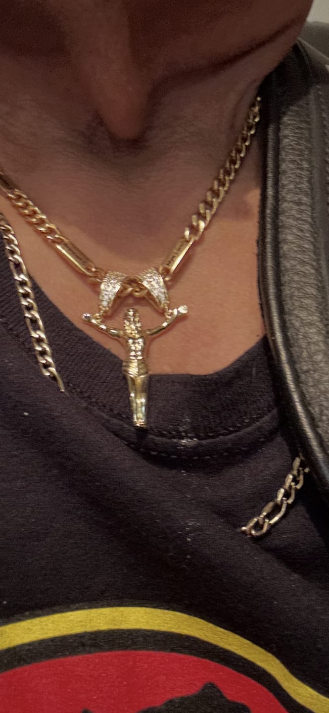 Customer photo review of FREE Today: Zircon Embellished Moving Crucifix Necklace: Bold Statement Sacred Faith Wearable Art