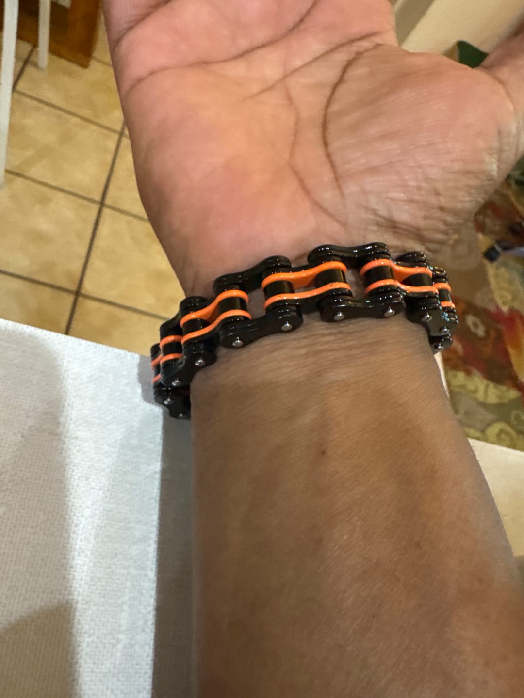Customer photo review of Cycolinks Black & Orange Bike Chain Bracelet