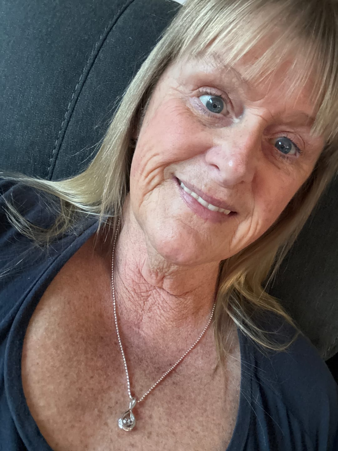 Customer photo review of Dancing Moissanite Infinity Necklace in Sterling Silver