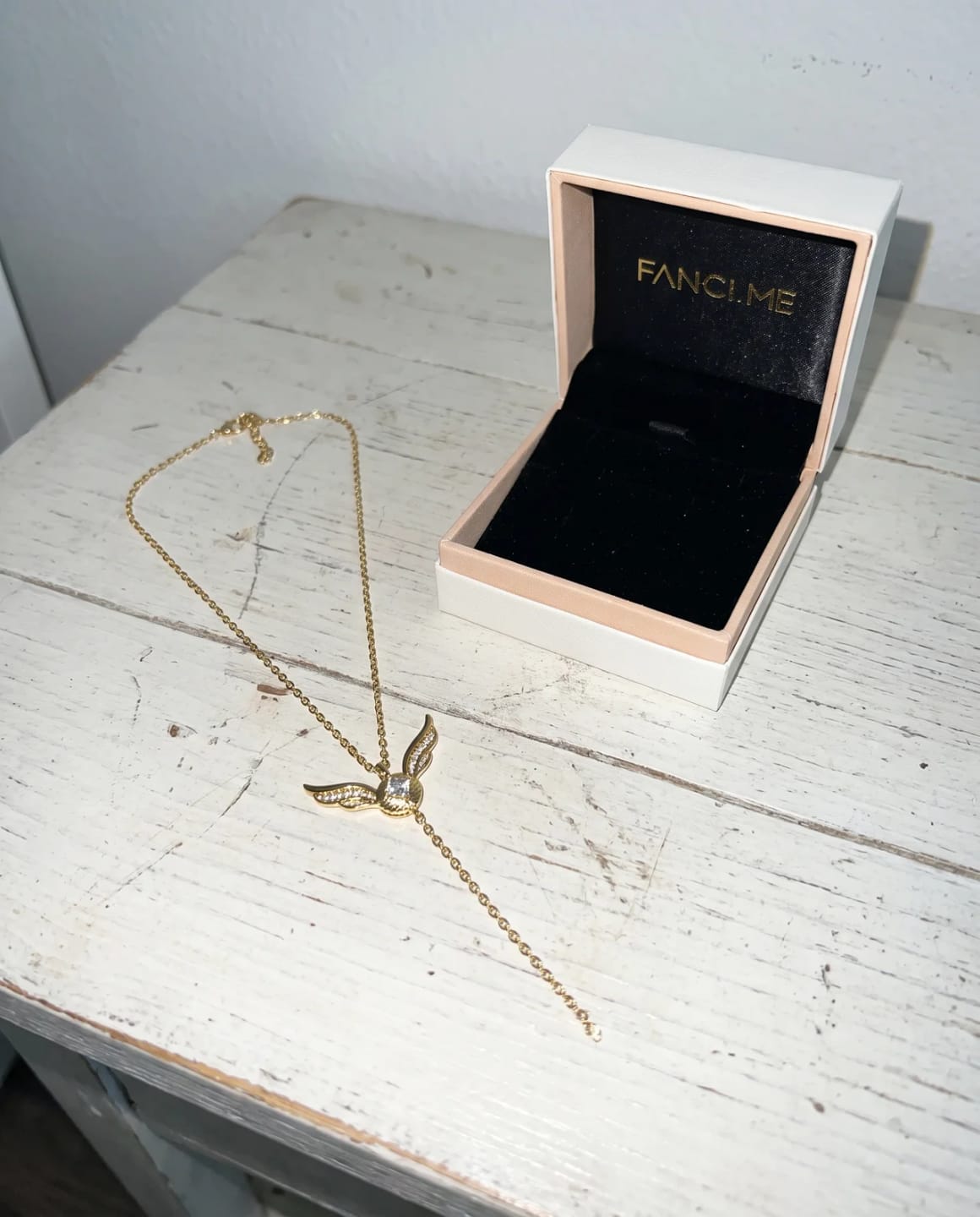 Customer photo review of Premium Golden Snitch Necklace