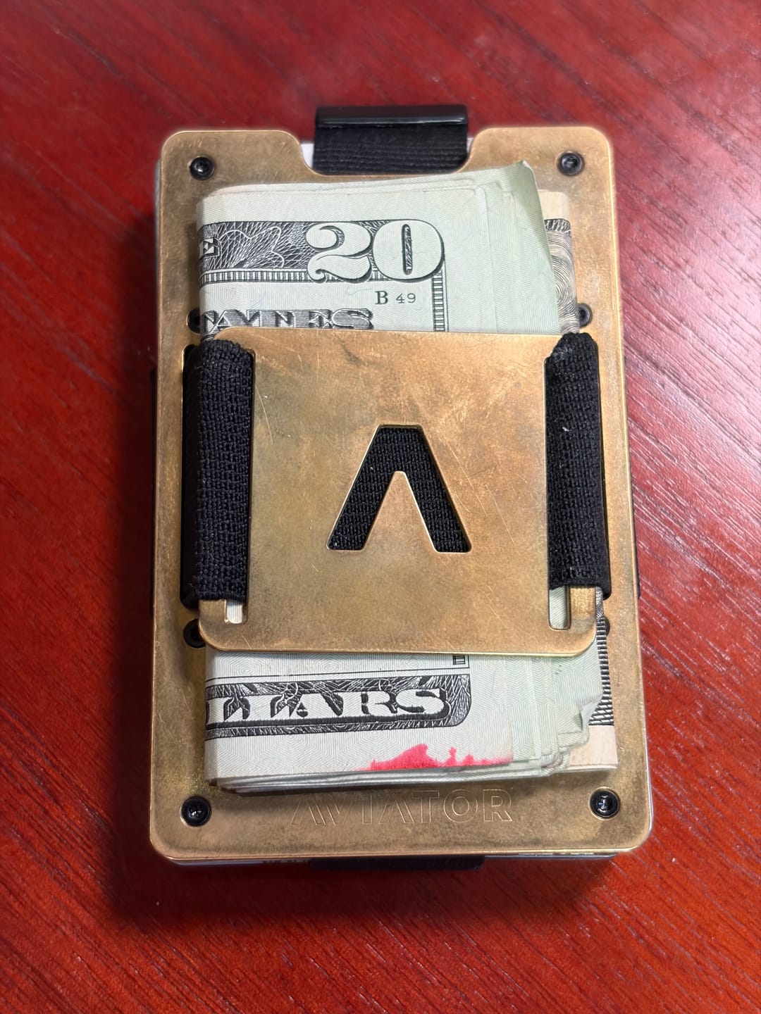 Customer photo review of Stonewashed Brass | Slide ONE Wallet + Brass Cash Clip