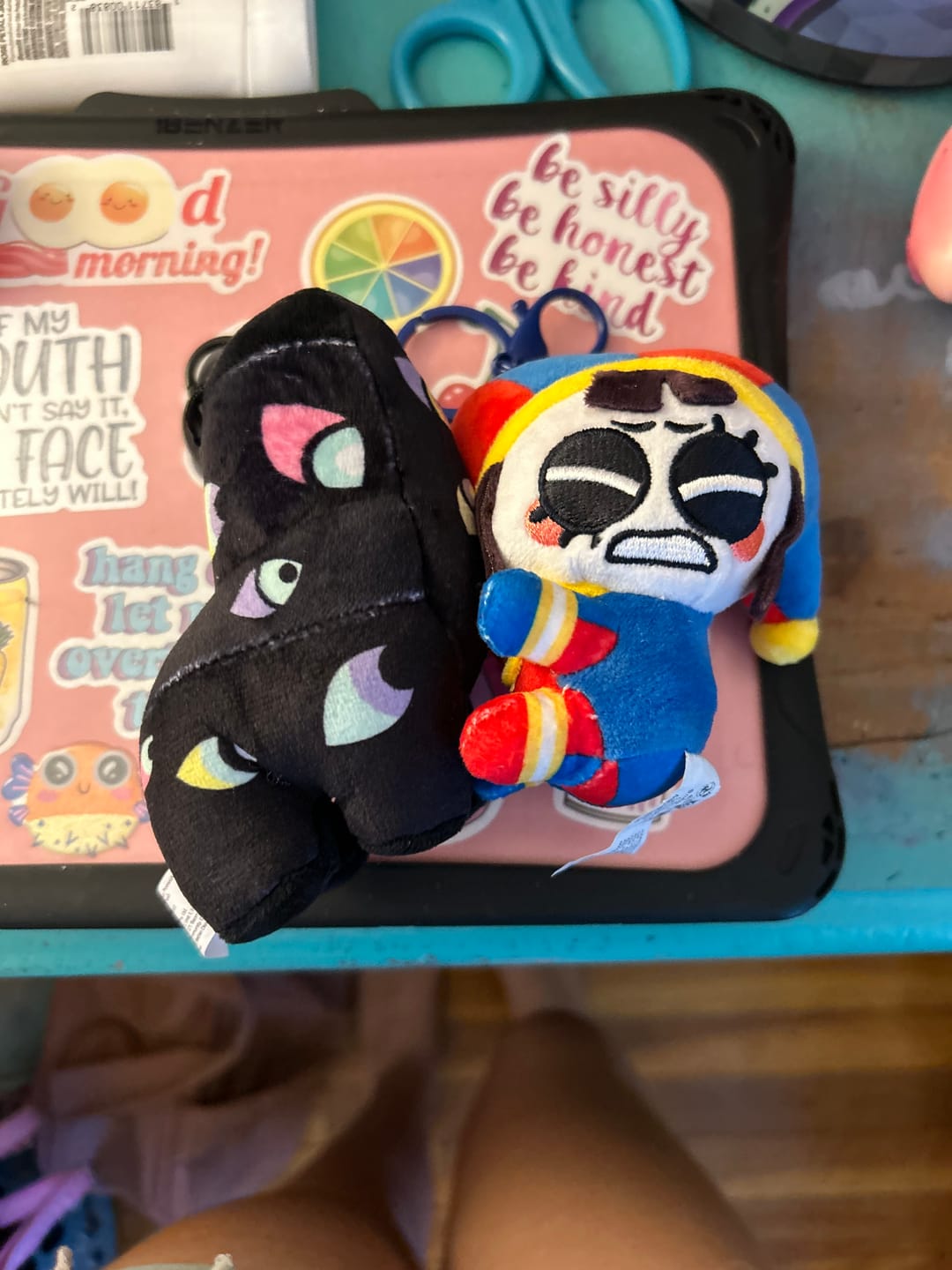 Customer photo review of Pomni & Abstraction Magnetic Plush Keychains