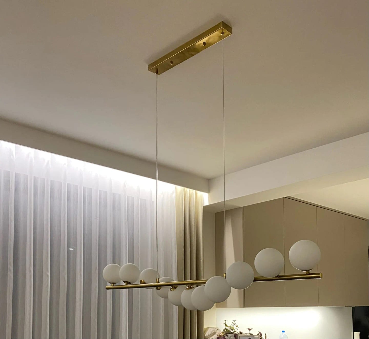 Customer photo review of Linear Wood Pendant Light, Walnut Bar, Opal Glass Globes, G9