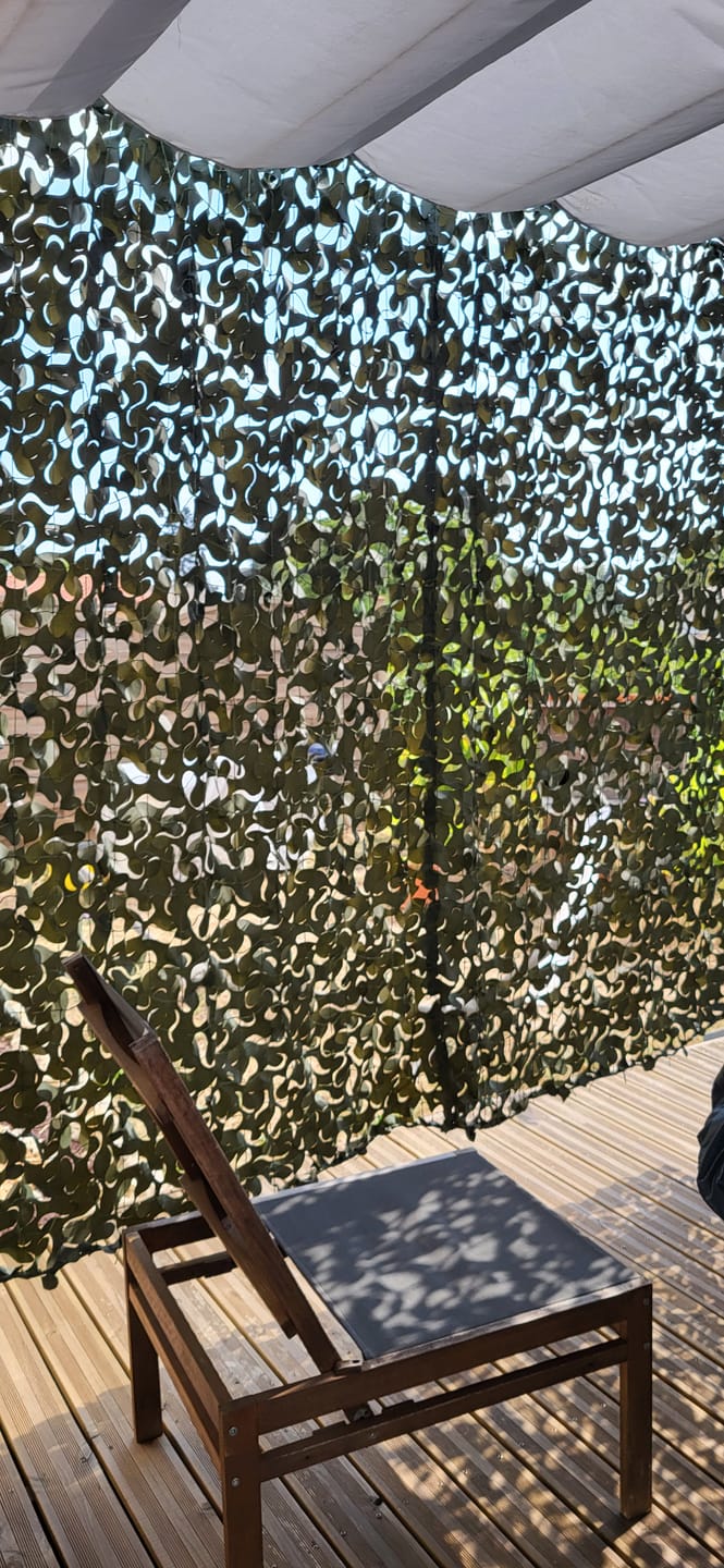 Customer photo review of Filet de camouflage renforcé vert