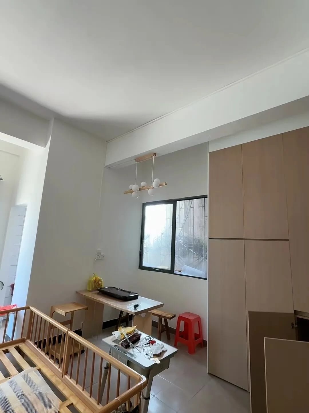 Customer photo review of Linear Wood Pendant Light, Walnut Bar, Opal Glass Globes, G9