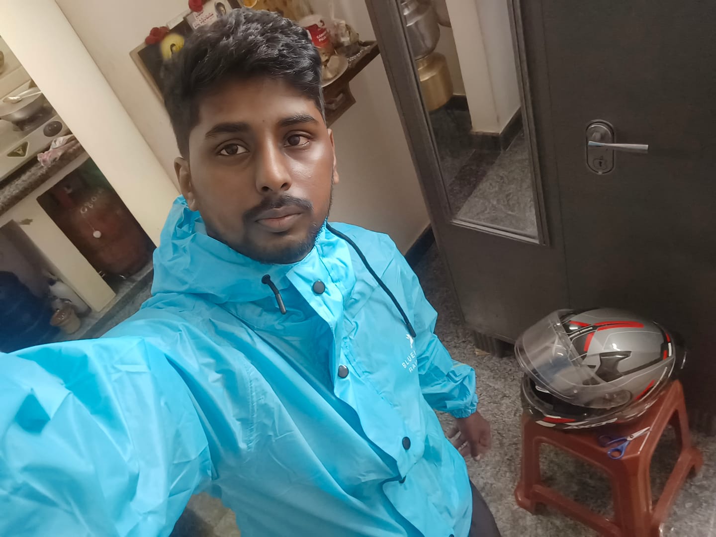 Customer photo review of Black with Wine Red - Rain Jacket with Pant and Mobile Pouch