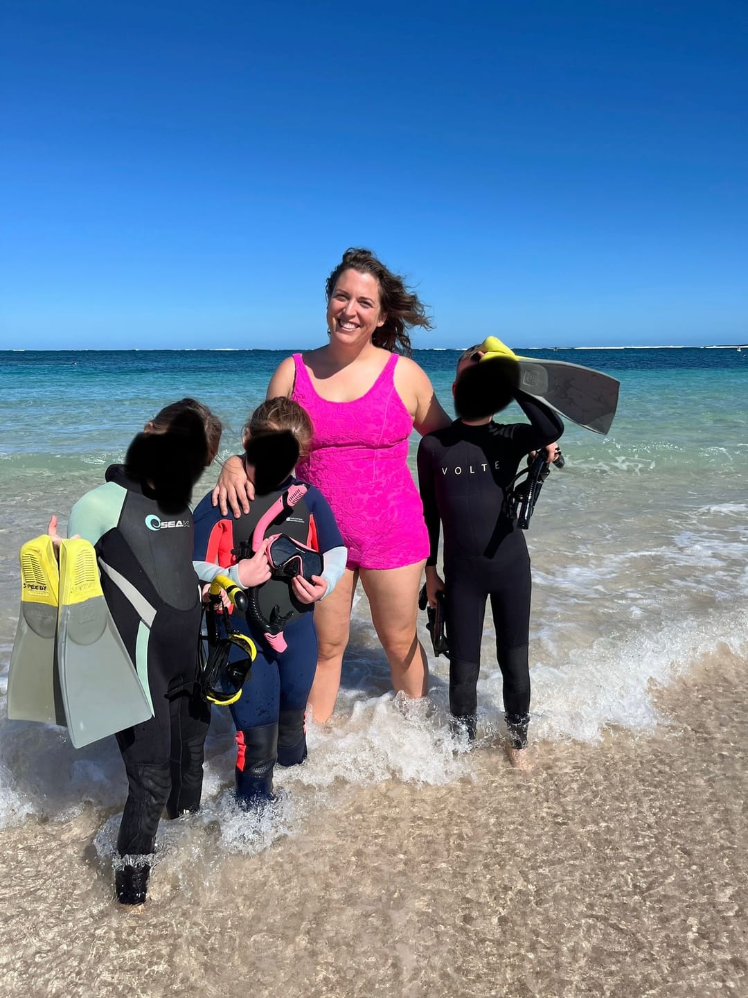 Customer photo review of HARPER SHORTY SURF SUIT - HIBISCUS POP