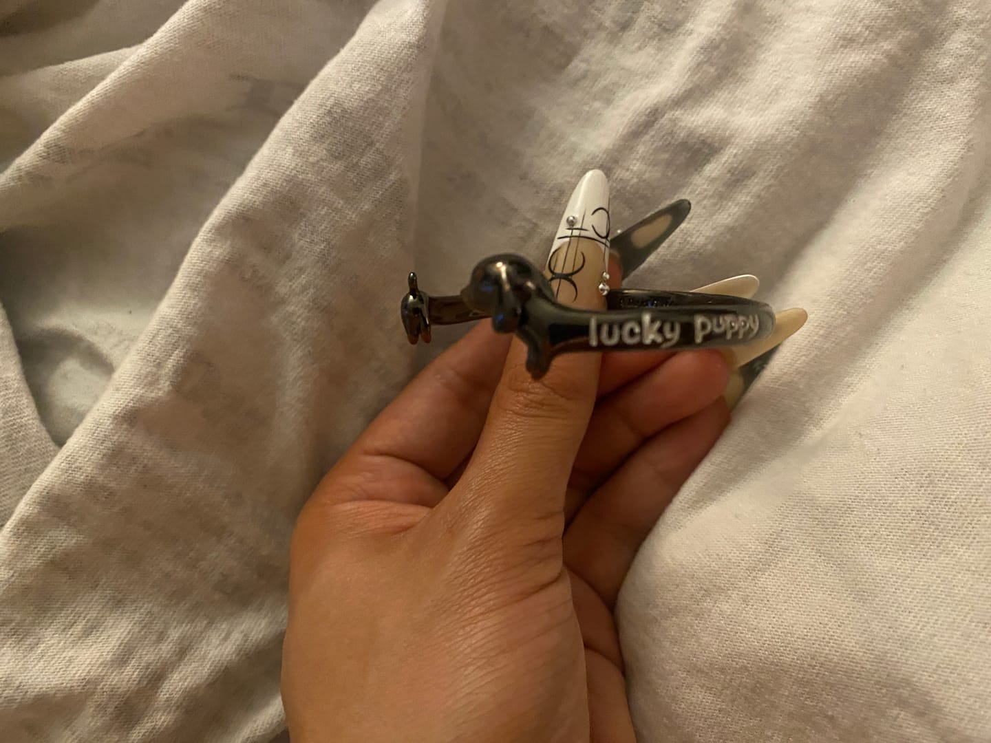 Customer photo review of Lucky Puppy 18K Black Gold Plated Original Sausage Dog Open Bangle Bracelet™
