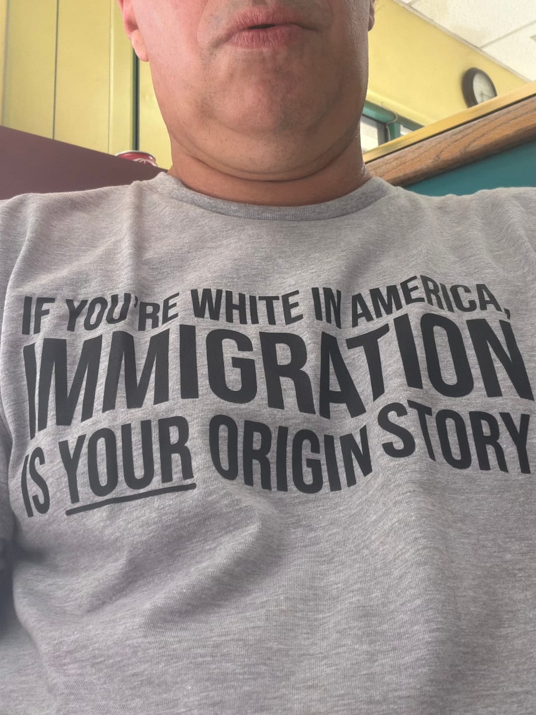 Customer photo review of If you're white in America, IMMIGRATION is your origin story Unisex Tee