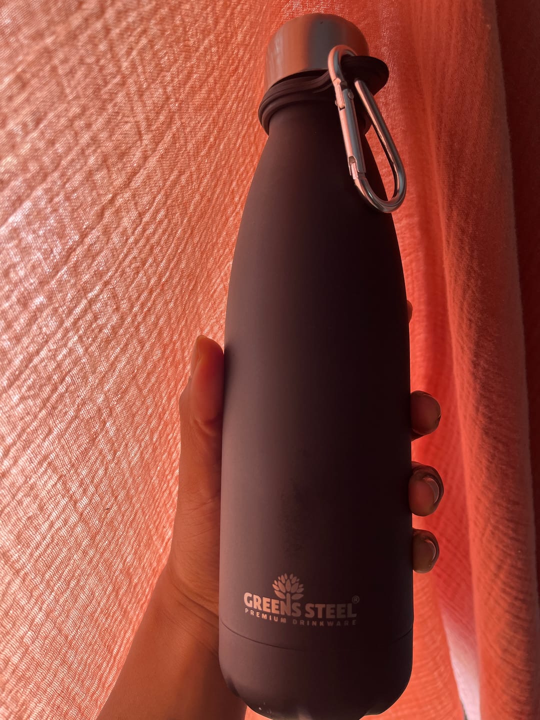 Customer photo review of Stainless Steel Double Wall Vacuum Insulated Water Bottle with Carrier Holder for Adults & Kids - 12 oz, 17 oz and 25 oz