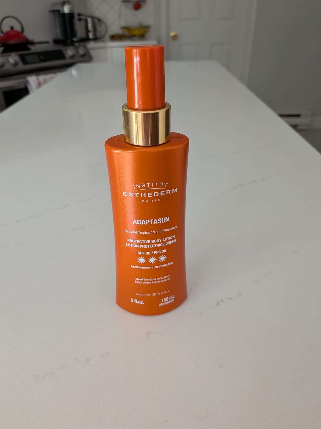 Customer photo review of Lotion protectrice corps FPS 30 - Adaptasun