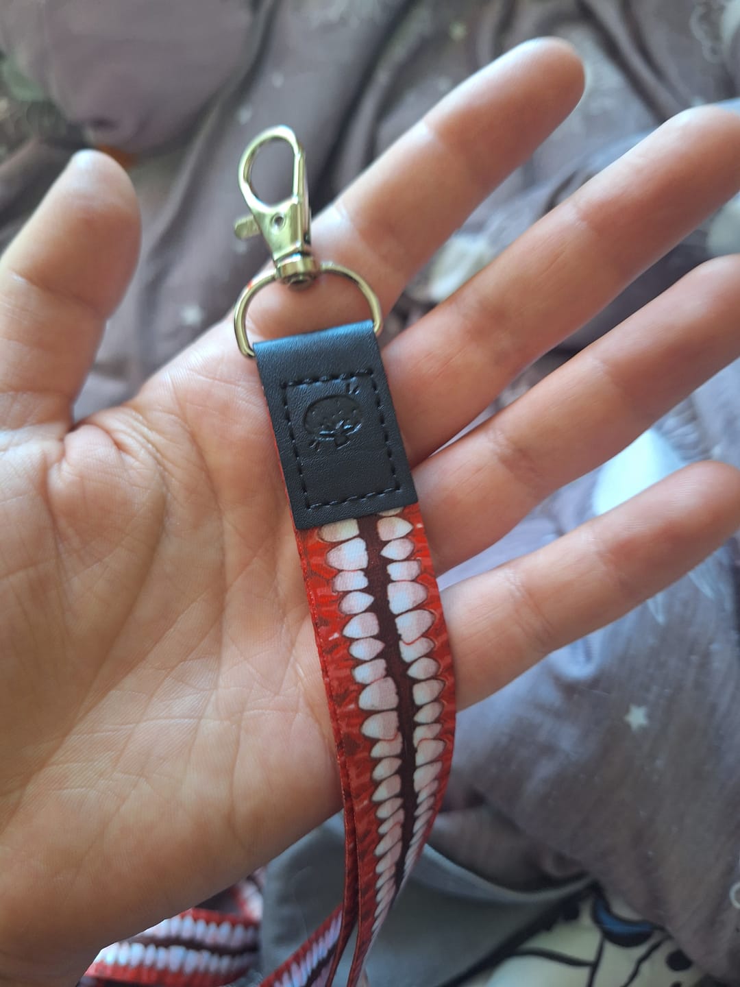Customer photo review of Creepy Teeth Lanyard!