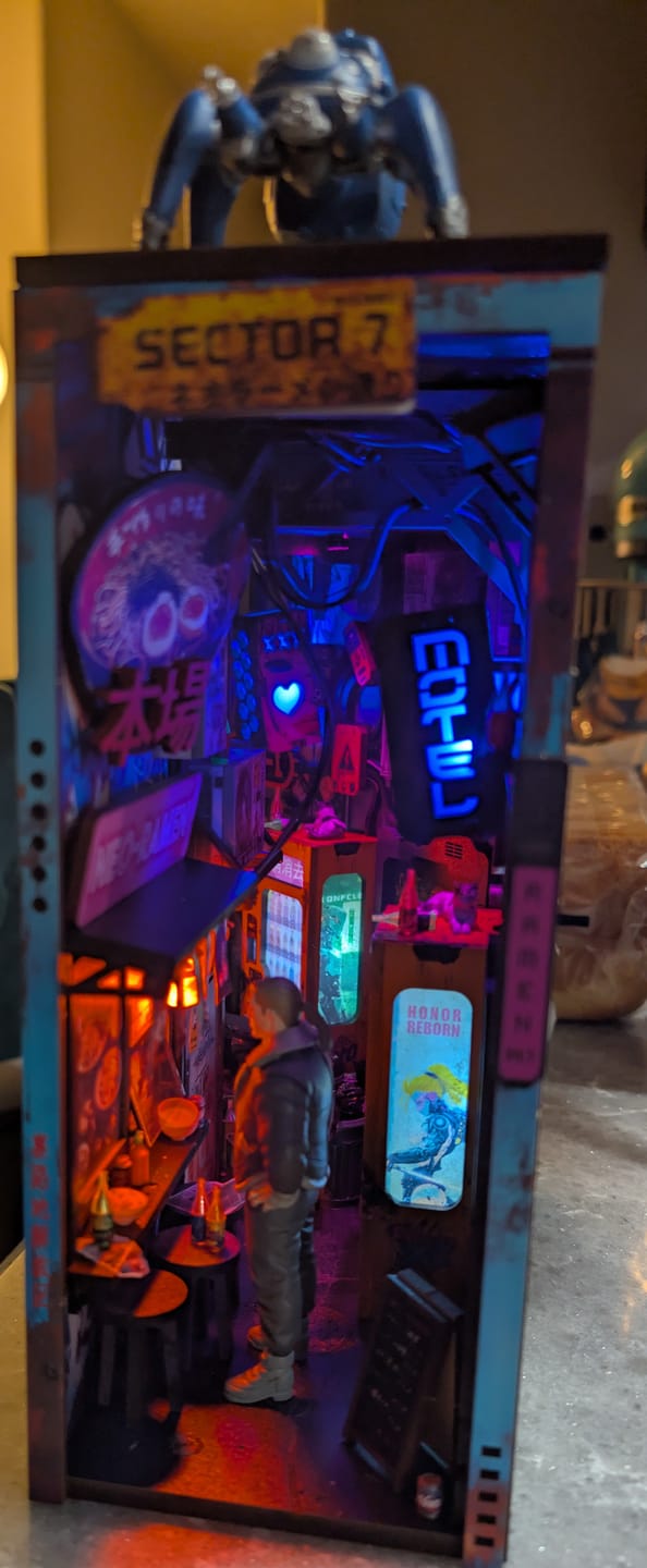 Customer photo review of Neon Ramen MiniAlley Cyberpunk DIY Book Nook Kit, Scale Model Kit,  Japanese Ramen Shop Miniature Scene