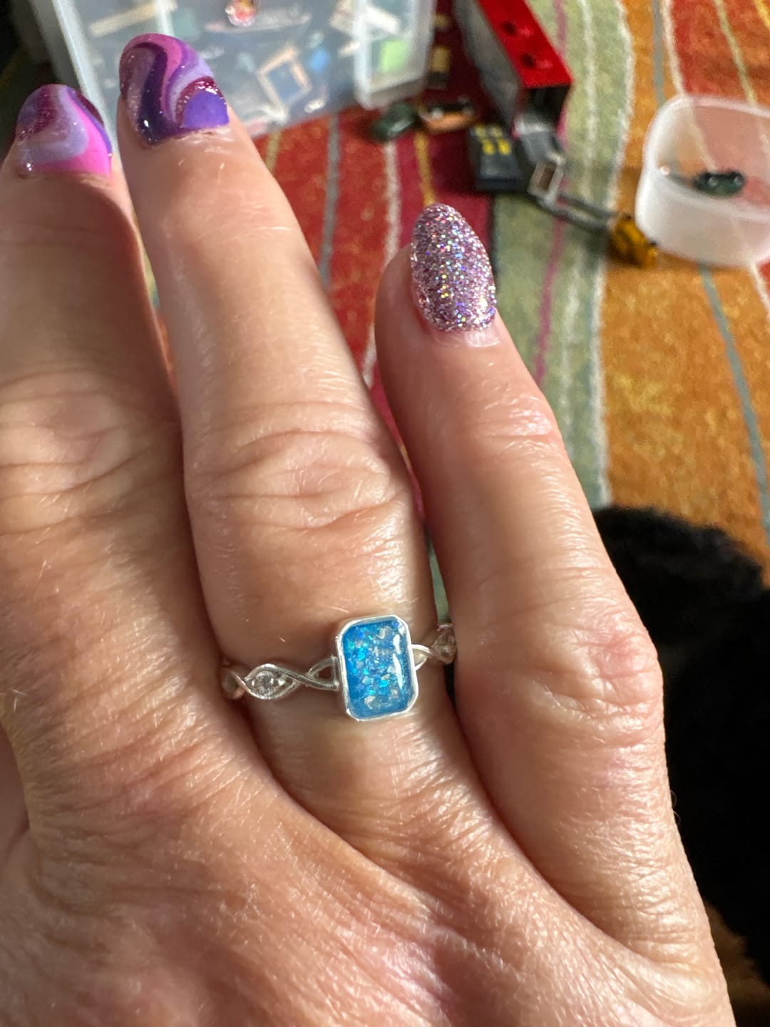 Customer photo review of Emerald shape Twist Band Cubic Zirconia Accent Ring