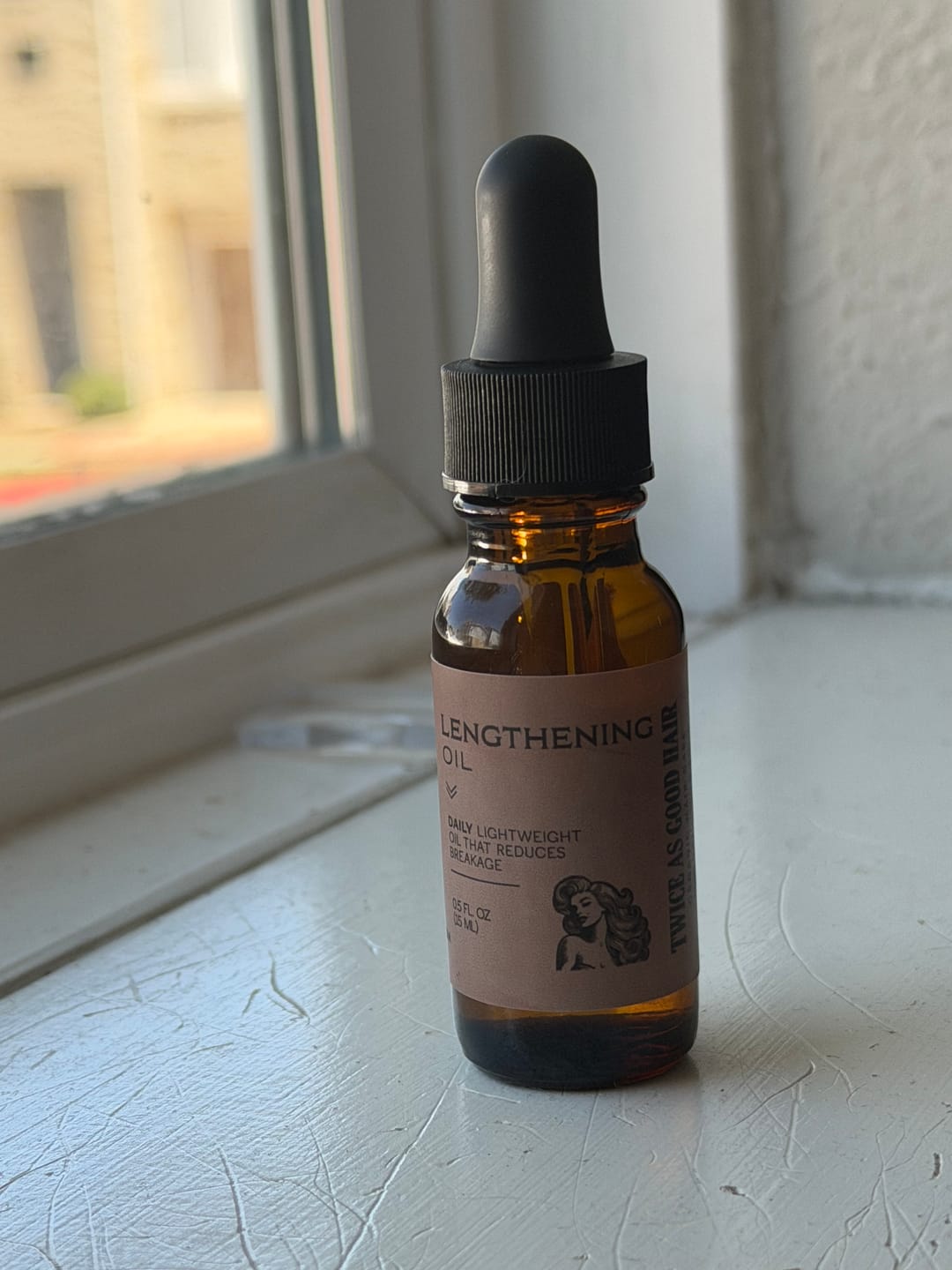 Customer photo review of Hair Lengthening Oil
