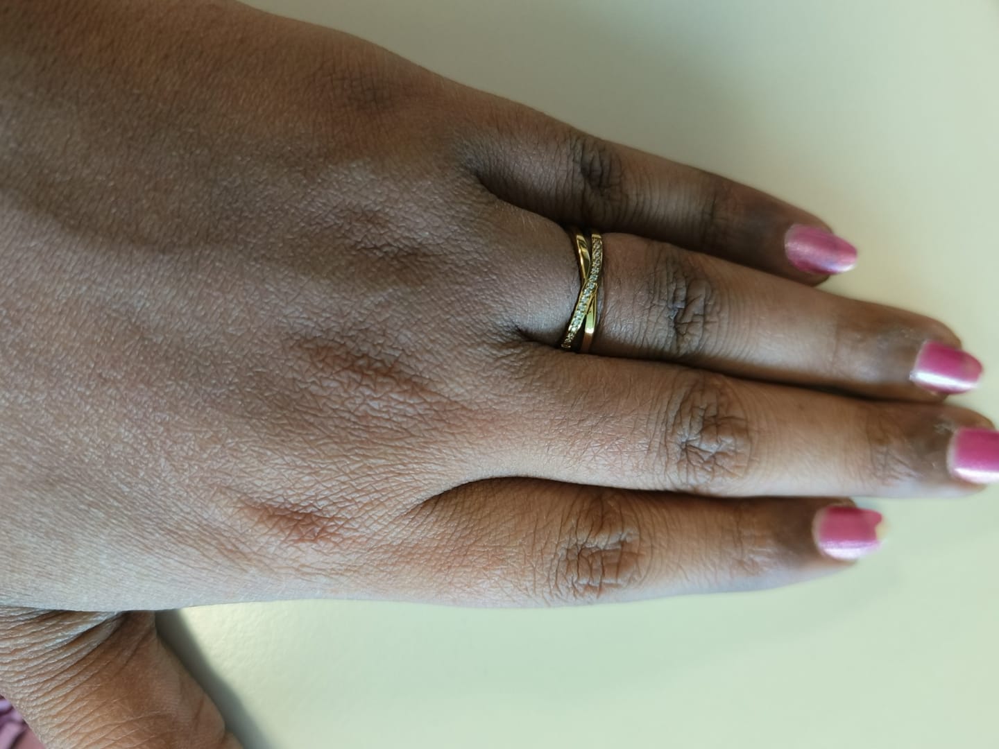 Customer photo review of Cross-Over Stones Lined Twist Ring