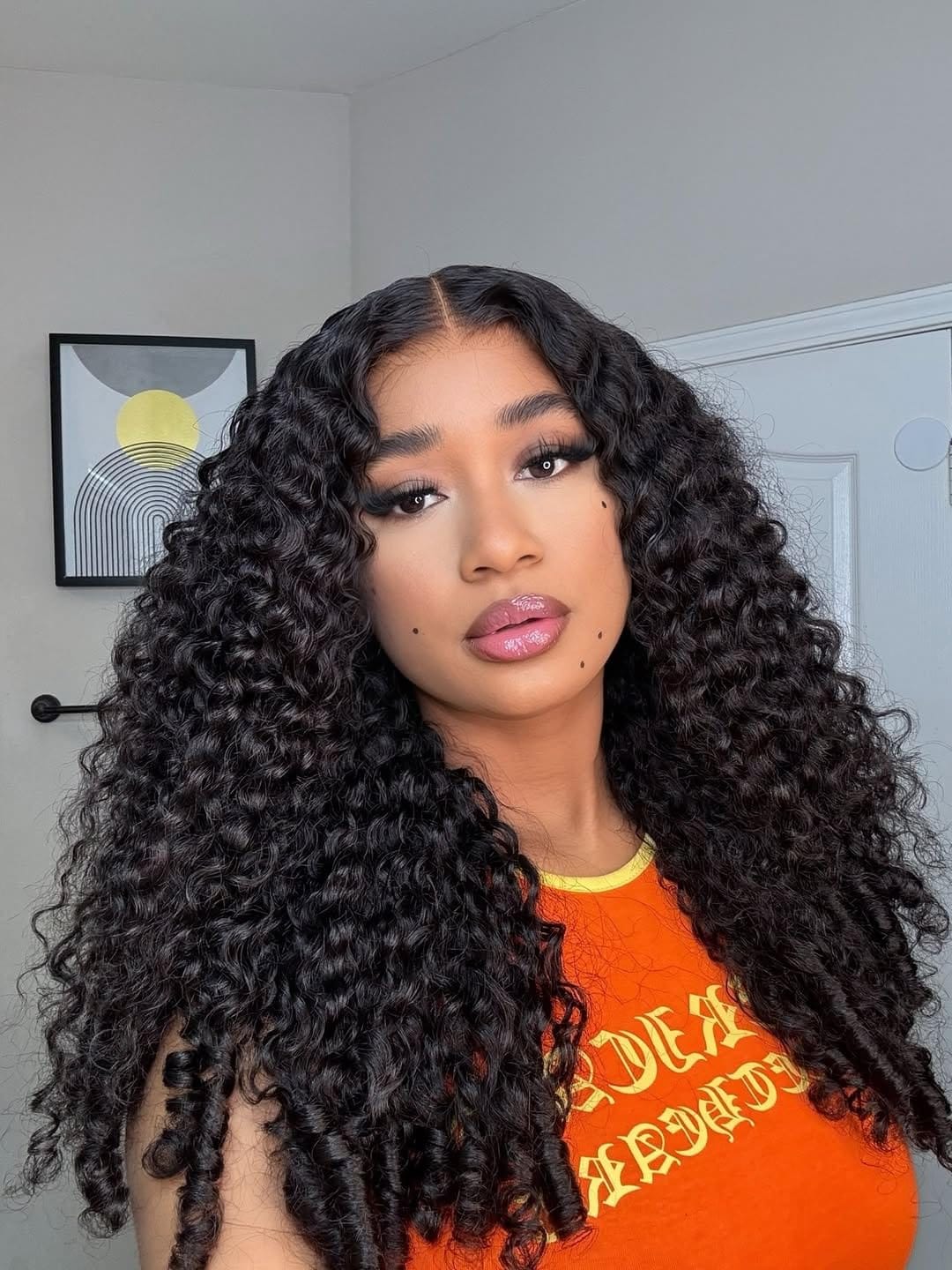 Customer photo review of Wavymy Burmese Curly Feather Crochet Hair Lightweight Miracle Knots Human Hair Extension