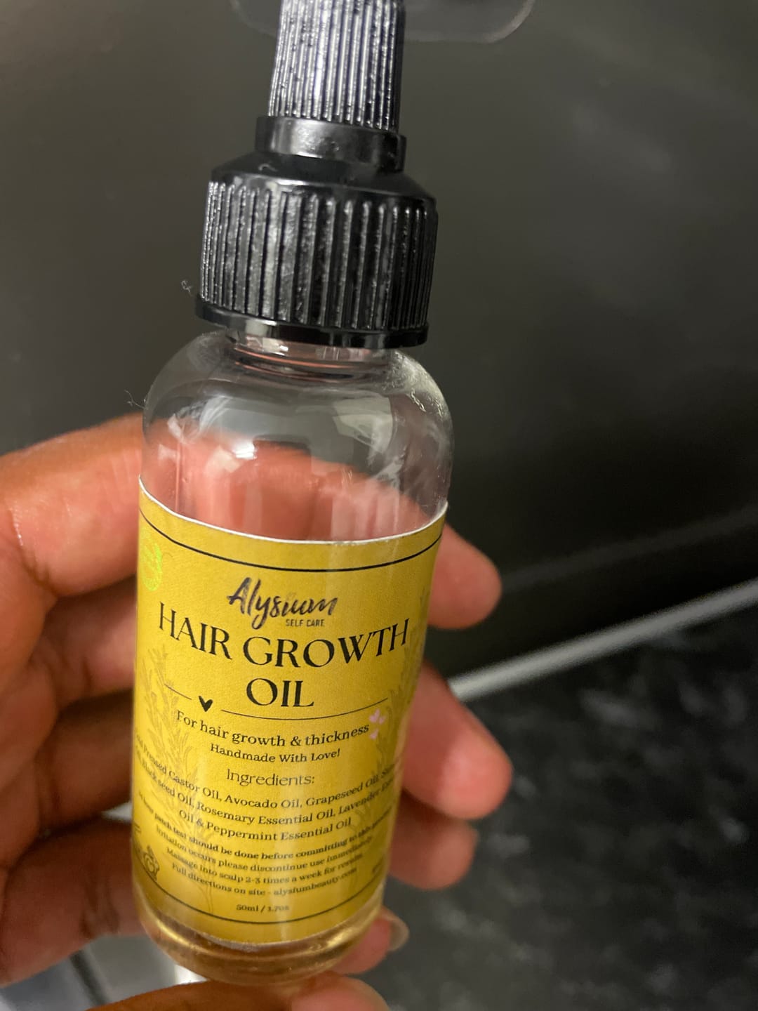Customer photo review of 100% Natural Hair Growth / Thickening Oil