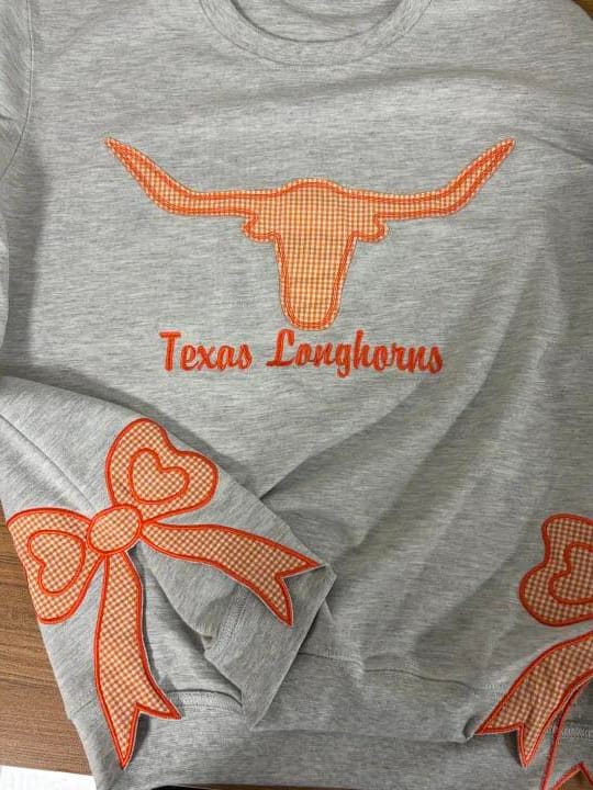 Customer photo review of Custom Tennessee Volunteers Women’s Team Spirit Sweatshirt – Applique Embroidered Side Bow Pullover