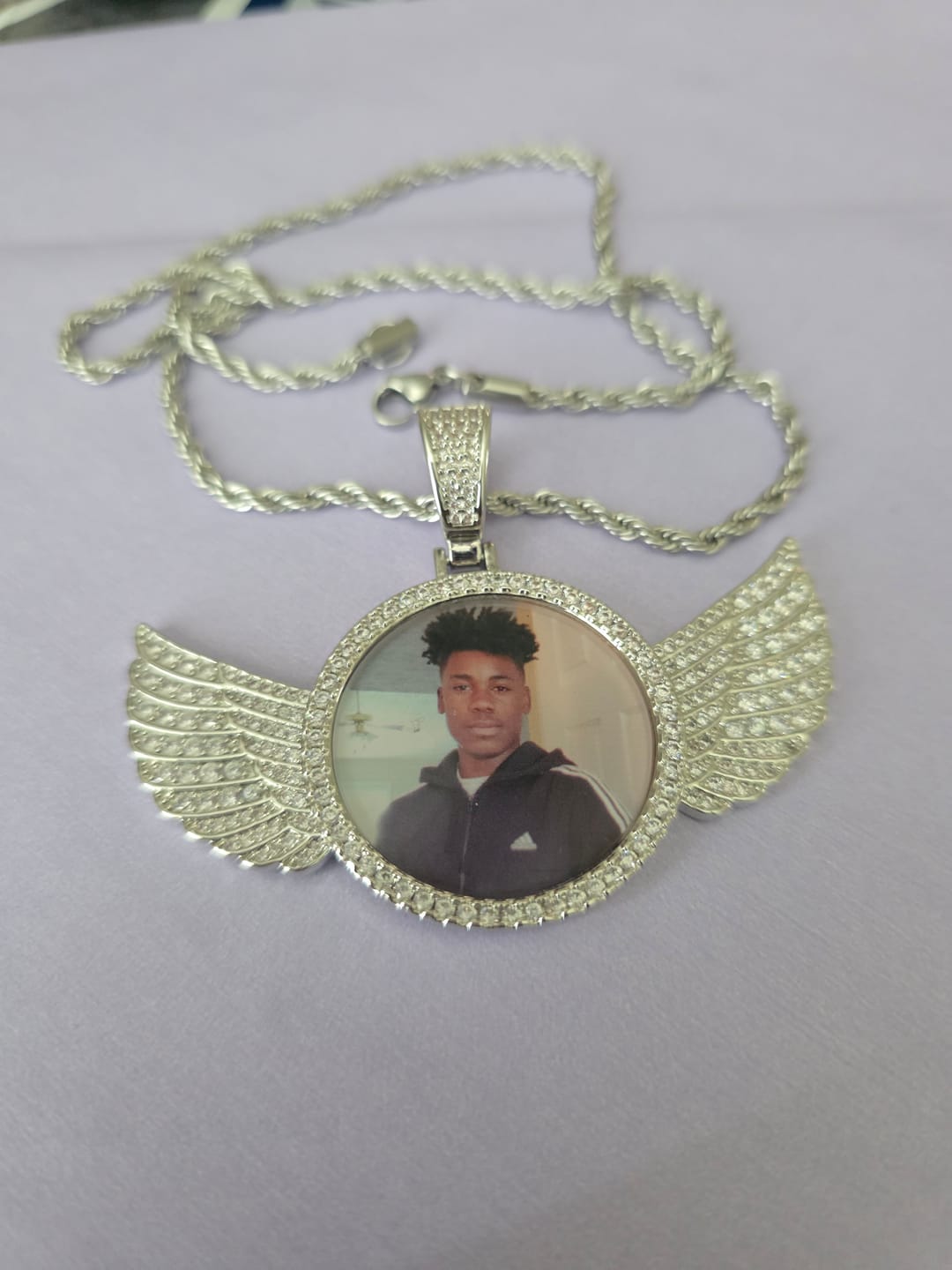 Customer photo review of Diamond Studded Angel Wing Photo Necklace
