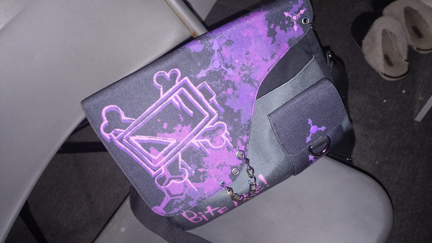 Customer photo review of Murder Drones Laptop Bag