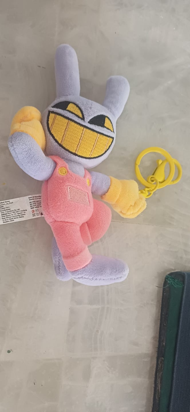 Customer photo review of Jax Keychain Plush