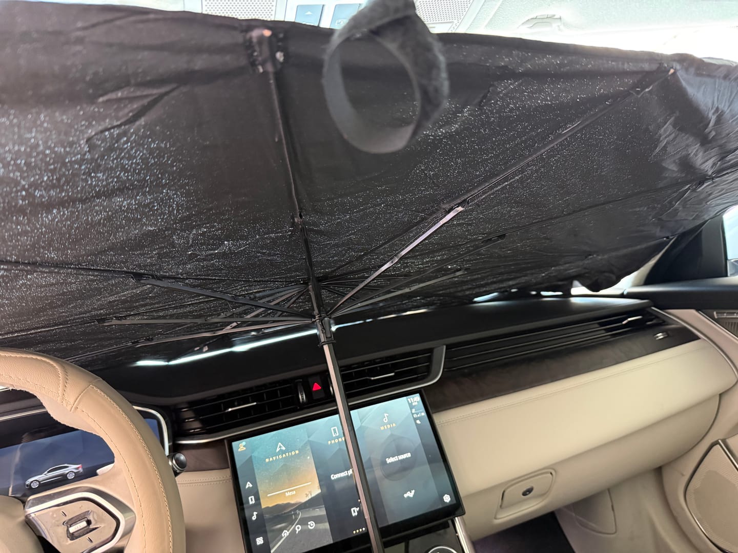 Customer photo review of Custom-Fit for BMW Windshield Sun Shade, Foldable Windshield Sunshade Sun and UV Protection, Car Sun Shade Windshield