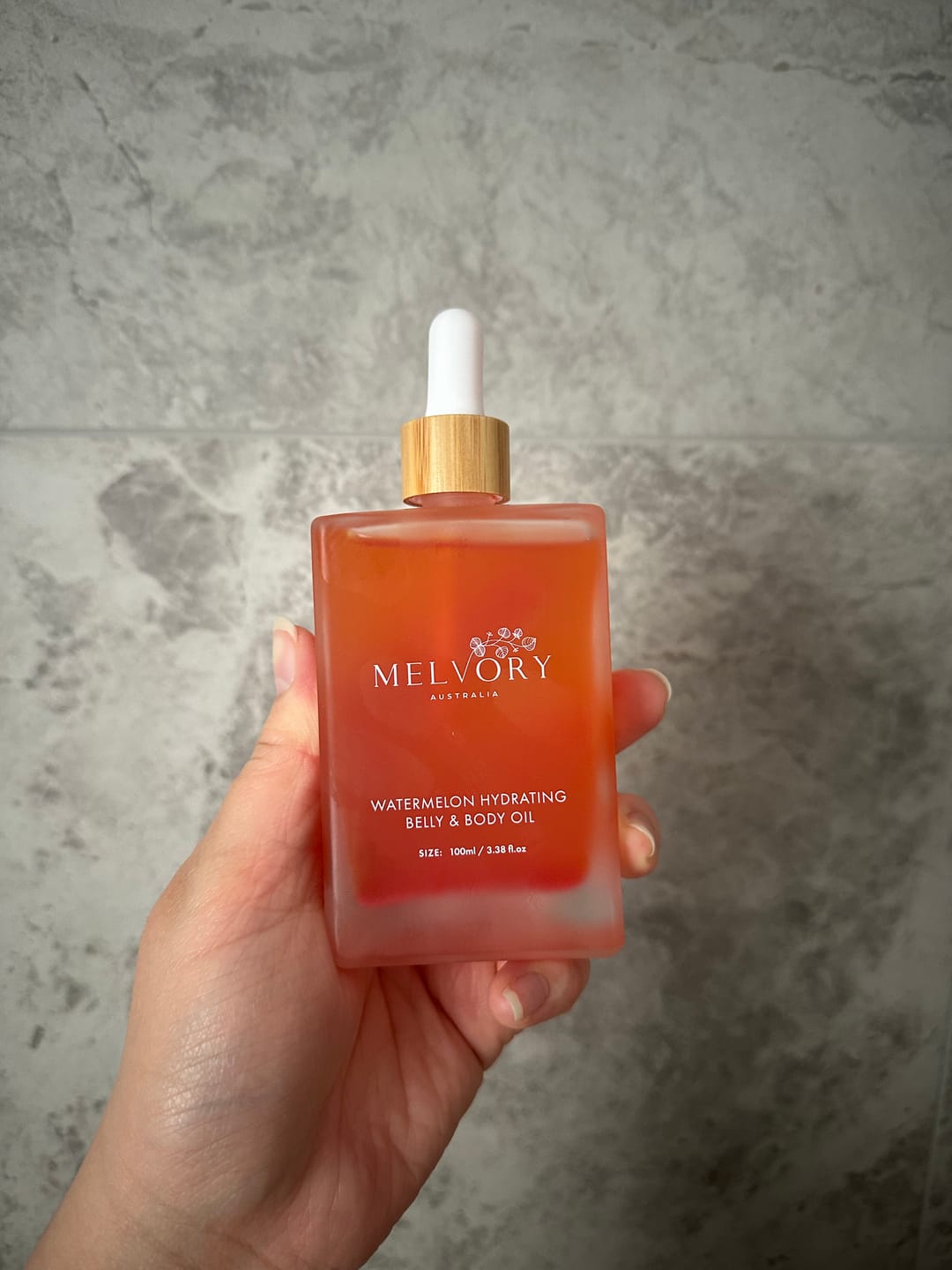 Customer photo review of Watermelon Nurturing Belly & Body Oil