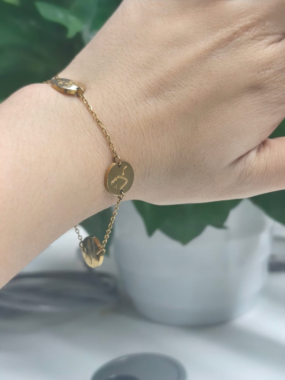 Customer photo review of HilalHaven Virtue Trio Sabr Hubb Shukr Calligraphy Bracelet — Polished Stainless Steel