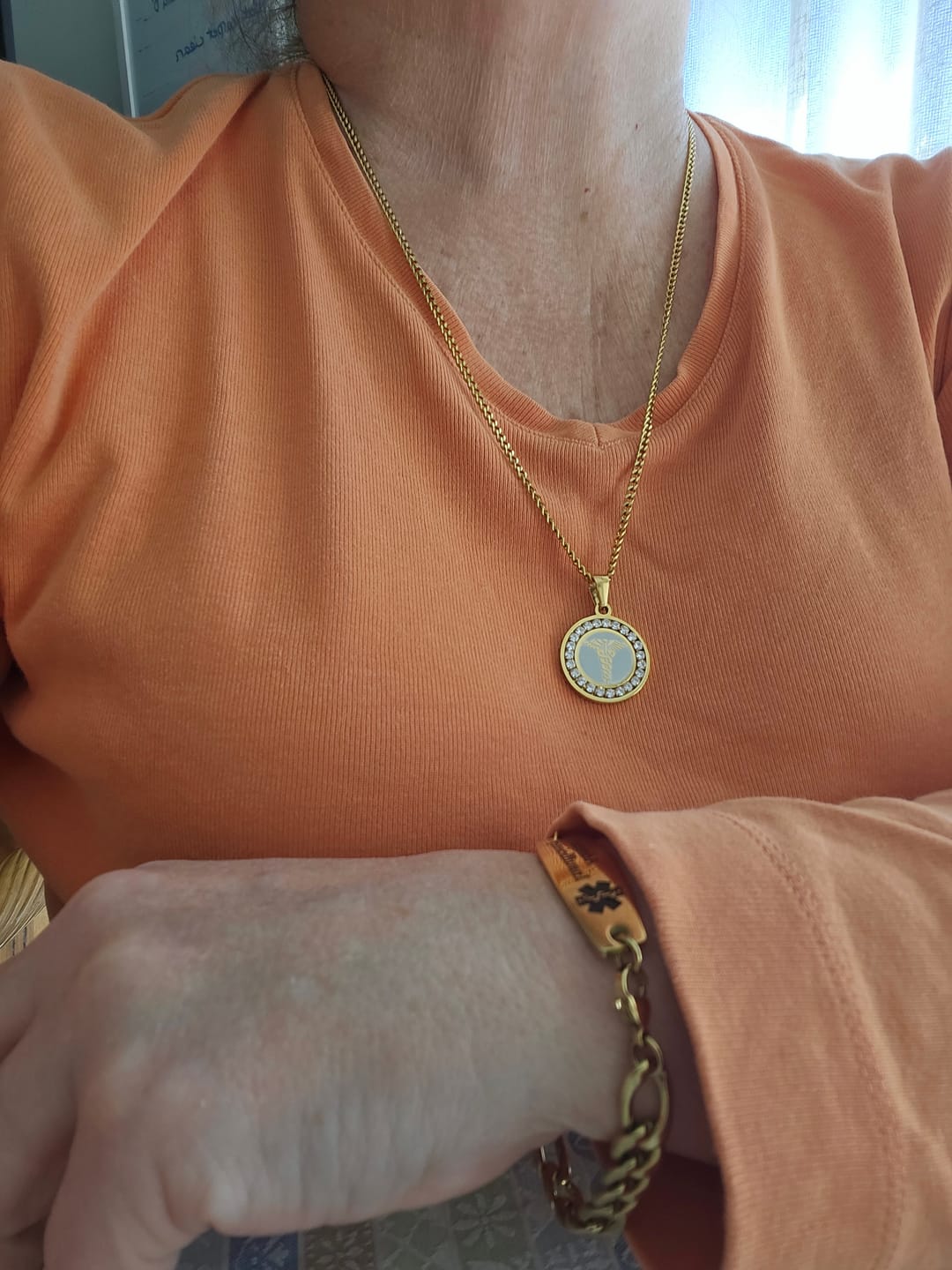 Customer photo review of Personalised Round Medical Tag ID Necklace – Gold Colour