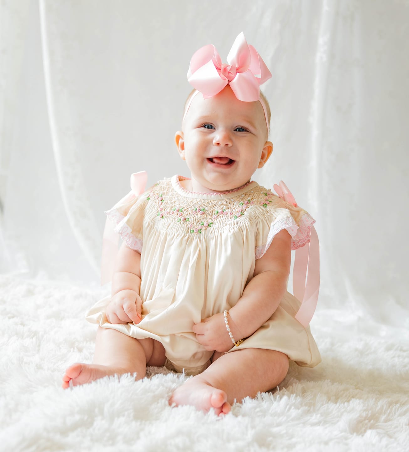Customer photo review of Cream Satin Rosette & Pearls Smocked Bishop Bubble