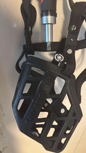 Customer's Premium Comfort Muzzle in black, showing the flexible cage design and adjustable straps for a secure fit.