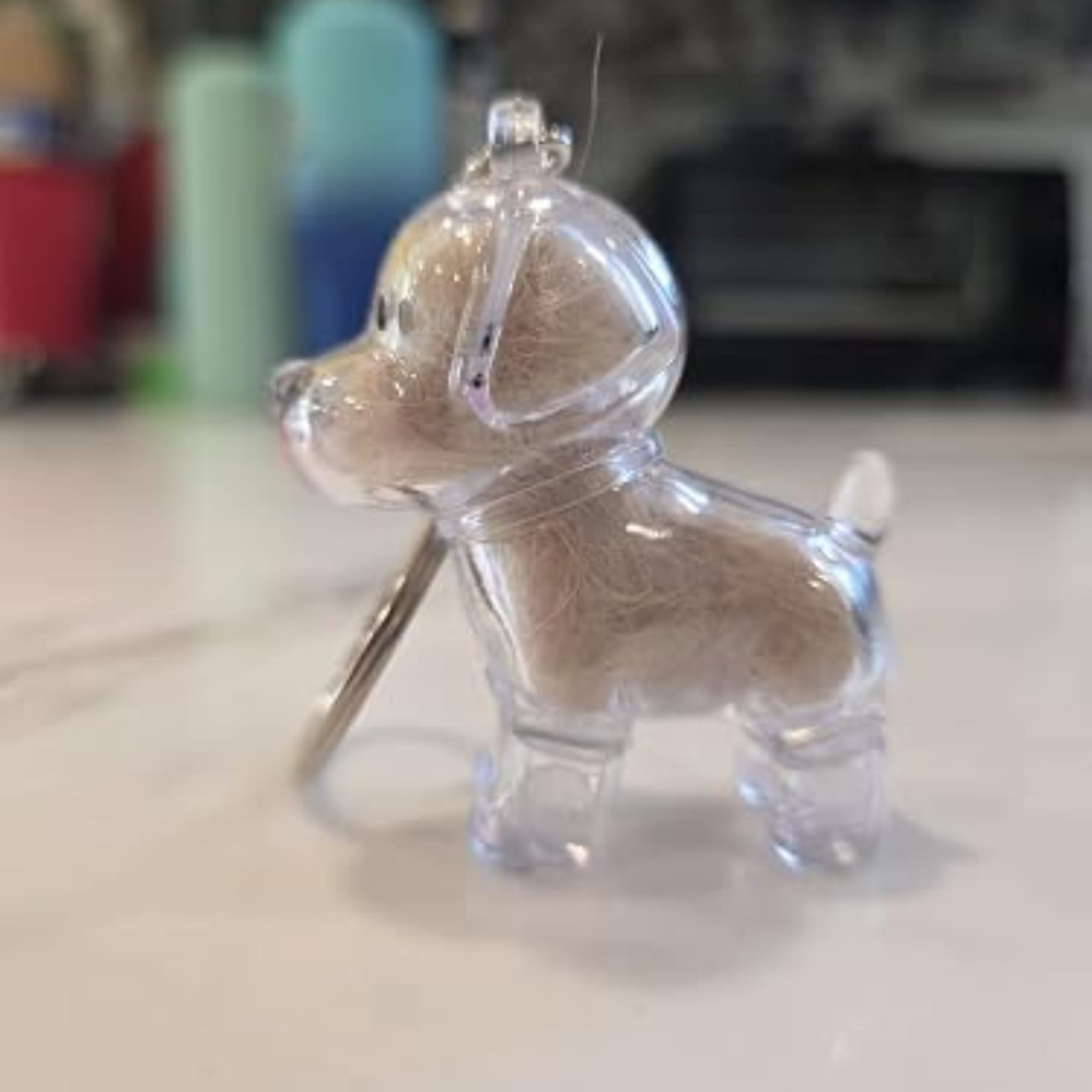 Customer photo review of Llavero para guardar pelo de mascota
