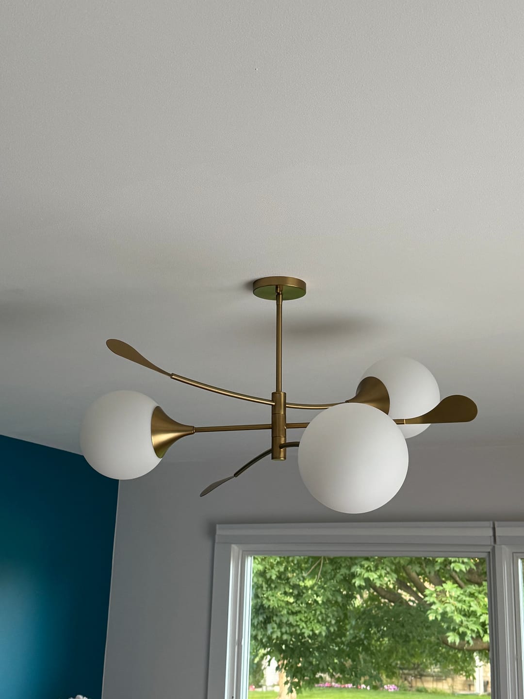 Customer photo review of Wind-Vane Tiered 3-Light Opal Glass Globe Sputnik Chandelier