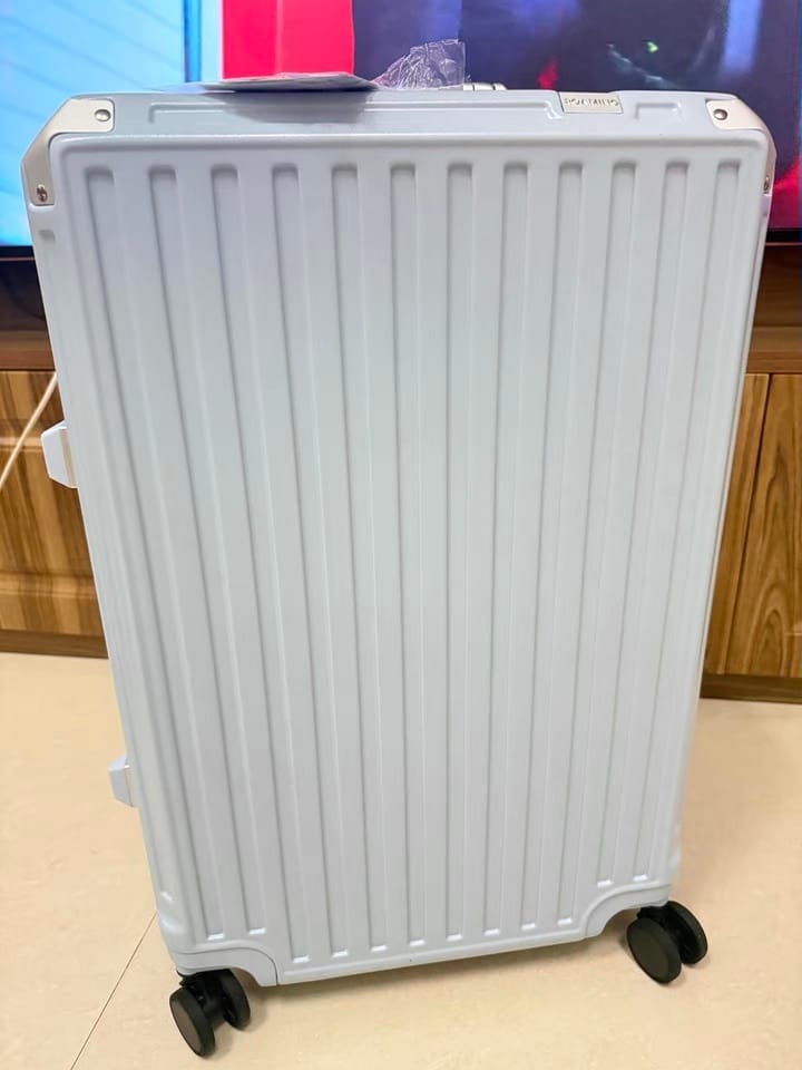 Customer photo review of Zipperless Carry-On Luggage