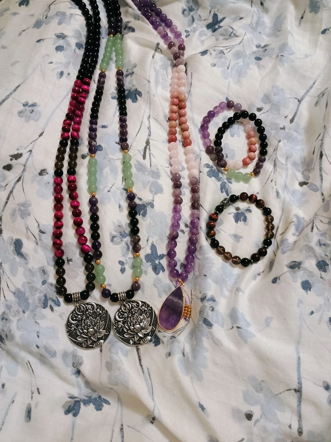 Customer photo review of 108 Natural Amethyst Rose Quartz & Rhodonite Mala Bead Necklace