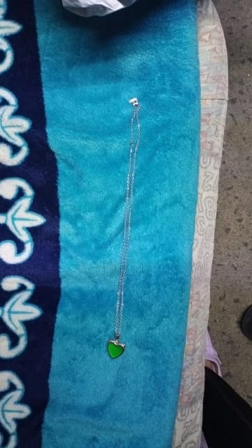 Customer photo review of Collar Corazón Cambia Color