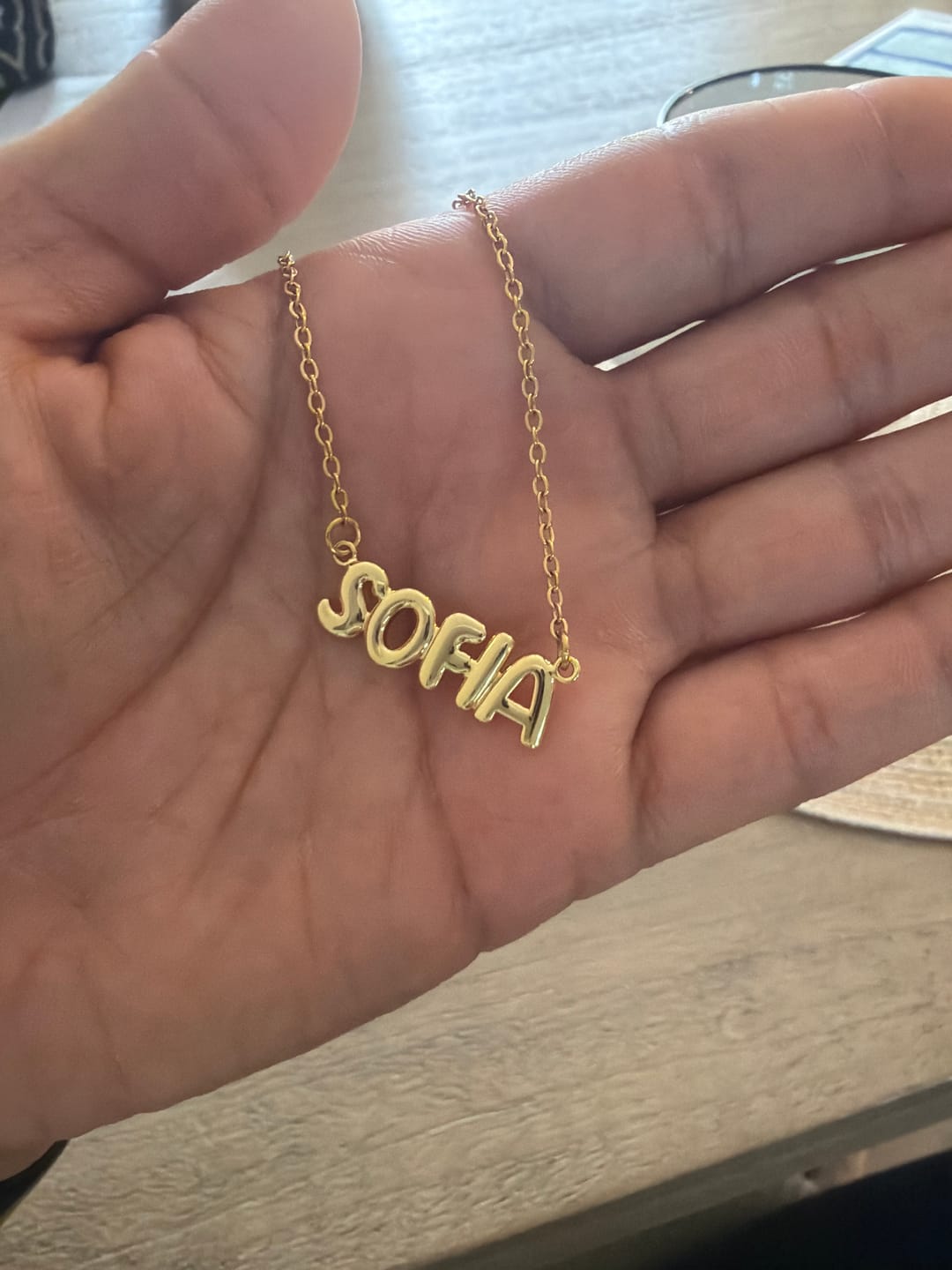 Customer photo review of Bubble Letter Name Necklace