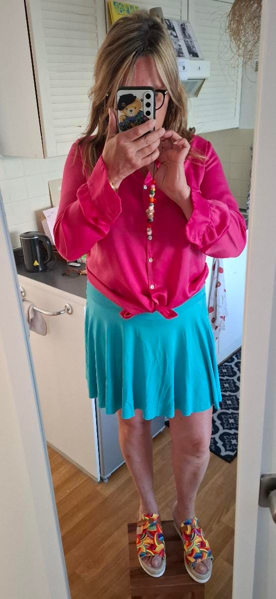 Customer photo review of Jupe-short de sport plissée avec poche