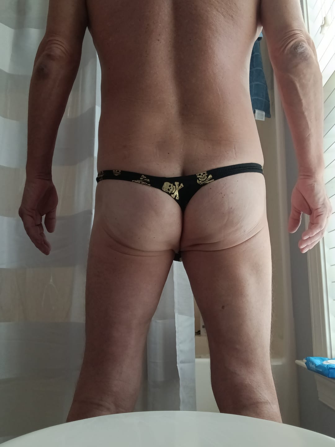 Customer photo review of 4 Pack Men's Ultra Thin High Elastic Quick Dry 3D Pouch Swim Thongs