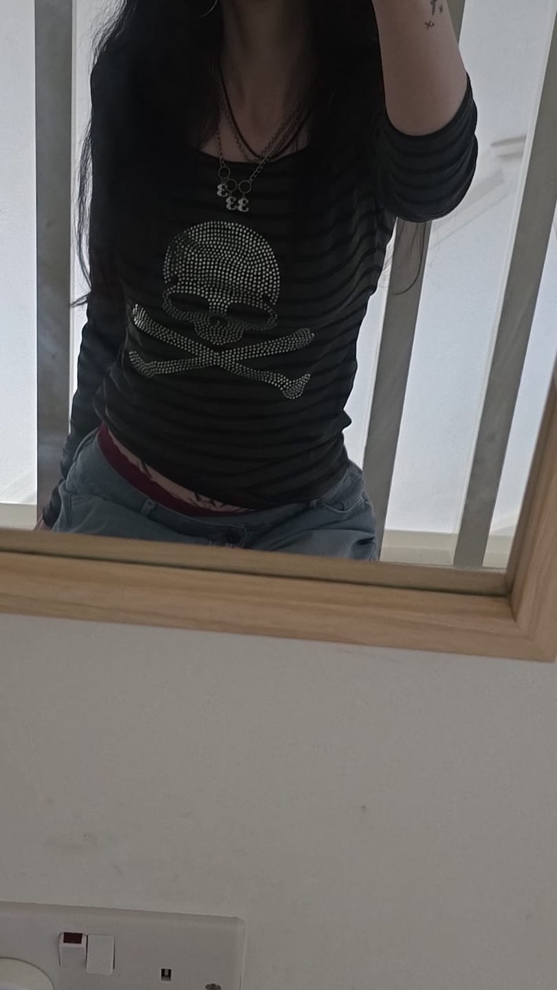 Customer photo review of Ravyne Bling Skull Stripes Knit Top
