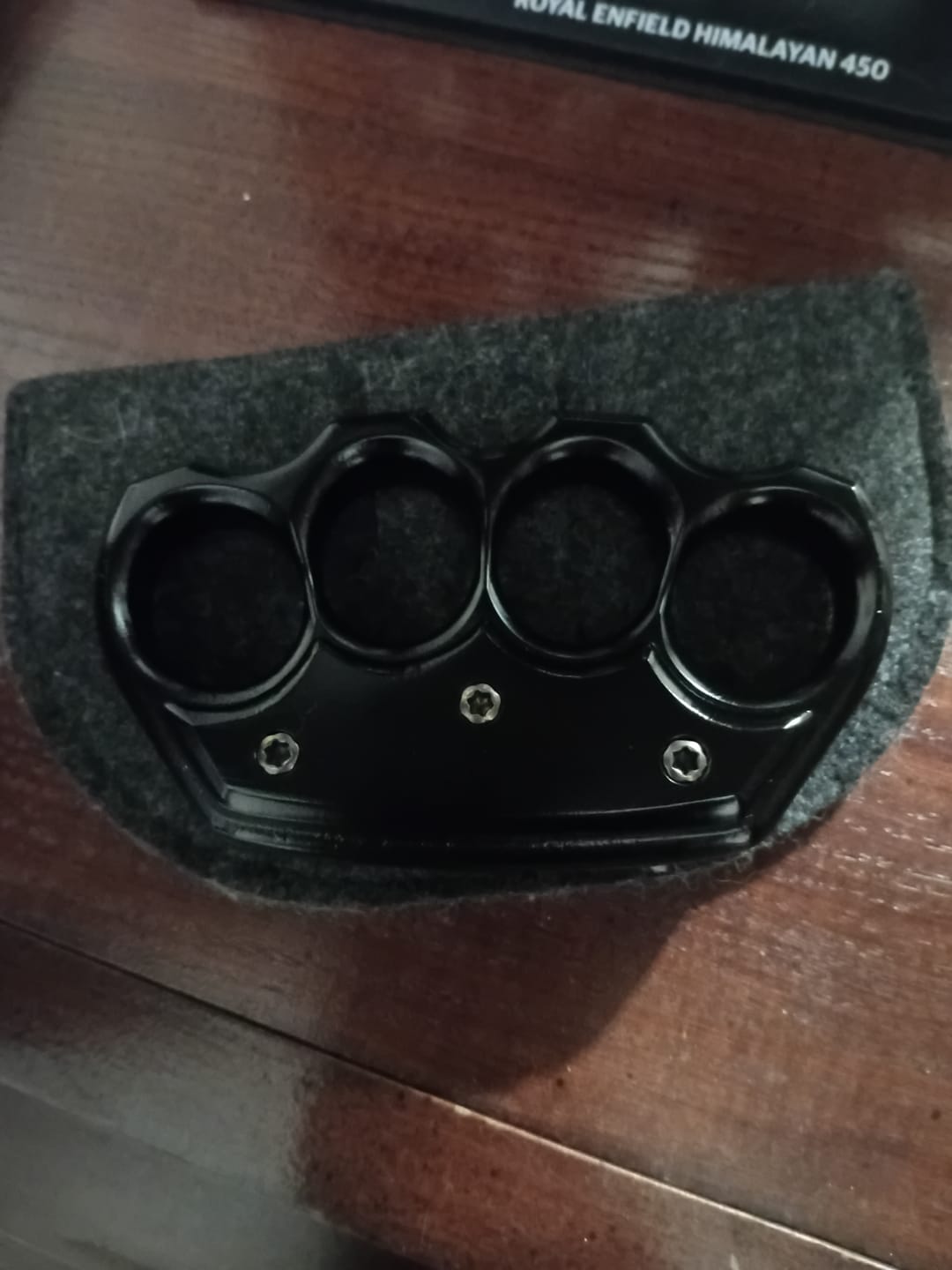 Customer photo review of Stainless Steel Knuckle Duster Paperweight