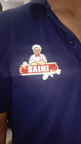 Customer photo review of Customized Magnetic Badge | Wear Your Brand