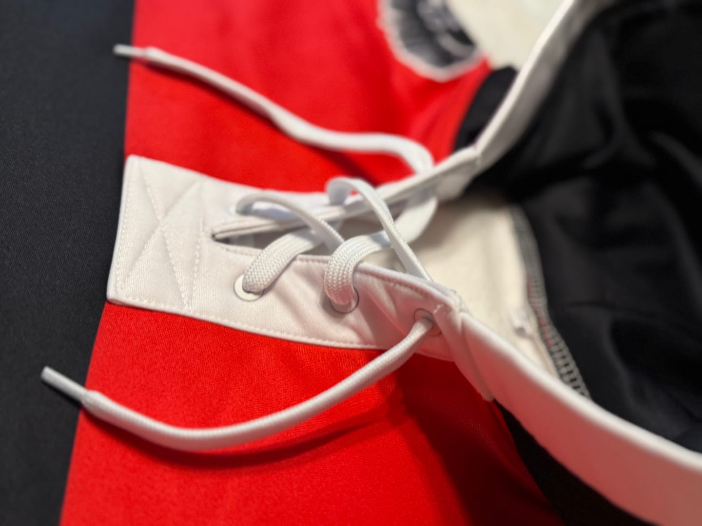 Customer photo review of Custom Black Red Classic Style Wrinkle-Resistant Lace-Up Neck Hockey Hoodie Jersey