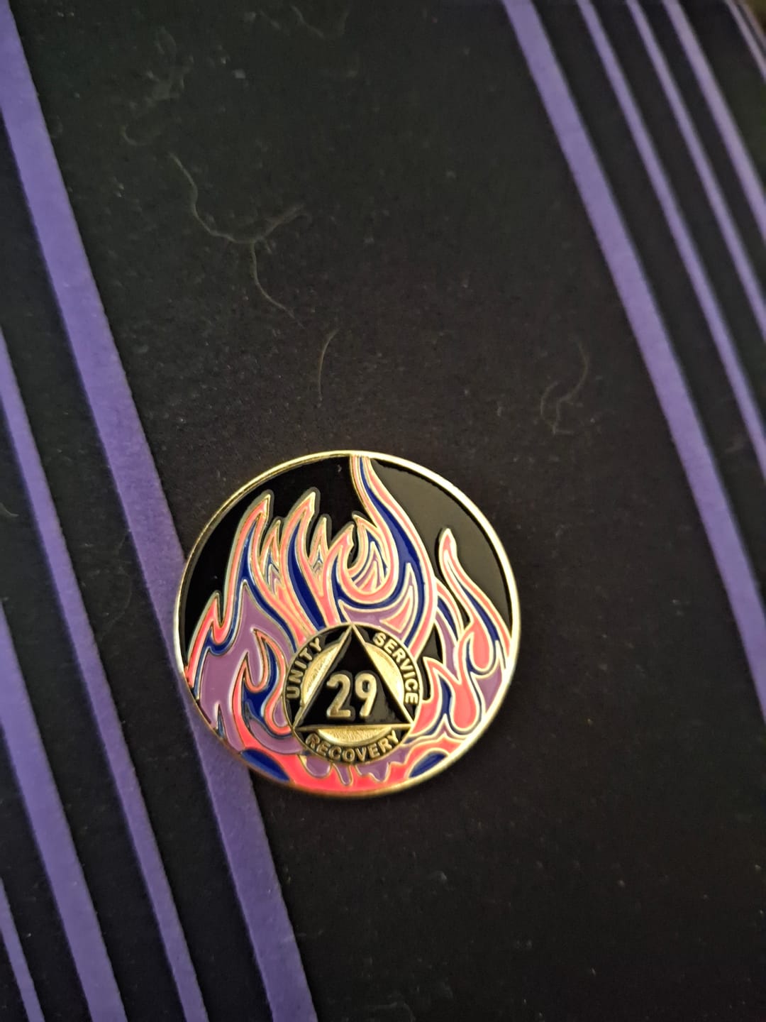 Customer photo review of 29 Year Sobriety Mint Twisted Flames Gold Plated AA Recovery Medallion - Twenty Nine Year Chip/Coin - Black/Pink/Purple/Blue